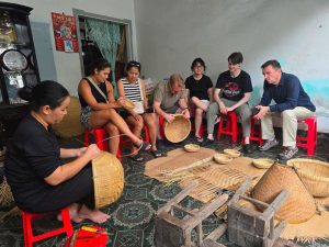 Sunrice floating market with wooden boat